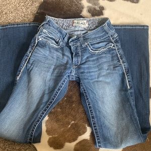 Ari at boot cut jeans